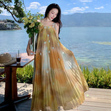 2025 Summer vacation style three-dimensional flower pleated smudged neck dress new loose meat covering and thin suspender dress