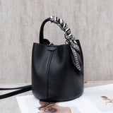 leather large-capacity bucket bag Korean version of messenger simple first-layer cowhide natural drop women's bag portable messenger bag
