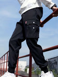 kkboxly  Men's Drawstring Flap Pocket Cargo Pants, Loose Trendy Jogger Pants