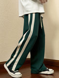 Men's Stylish Loose Solid Sweatpants With Pockets, Active Breathable Comfy Drawstring Trousers For Breakdancing Skateboarding Taking Photos