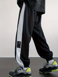 kkboxly  Chic Color Block Joggers, Men's Casual Stretch Waist Drawstring Sports Pants Sweatpants