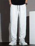 kkboxly  Men's Letter Print Joggers, Casual Stretch Tapered Sports Pants