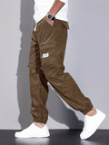 kkboxly  Men's Stylish Solid Corduroy Cargo Joggers With Pockets, Causal Breathable Drawstring Men's Bottom Clothing For City Walk Street Hanging Outdoor Activities
