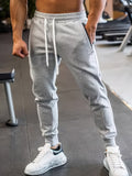 kkboxly Solid Men's Chic Daily Long Drawstring Footed Trousers With Pockets, Spring Fall Outdoor, Workout Fitness