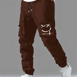 kkboxly  Smile Print, Men's Drawstring Cargo Pants, Flap Pocket Loose Trendy Jogger Pants, Mens Work Pants