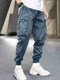 kkboxly Men's Stylish Letter Graphic Cargo Pants with Flap Pockets - Drawstring Waist for Comfort